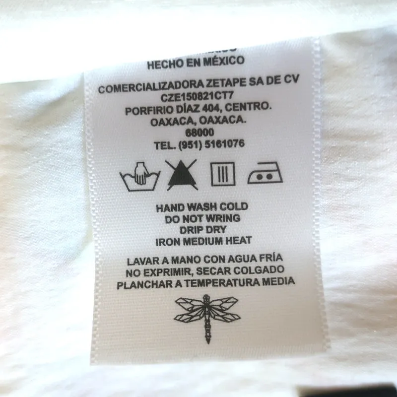 Draco Besticktes Crop Top mit Rückenaussatz in Creme/Mehrfarbig Größe M