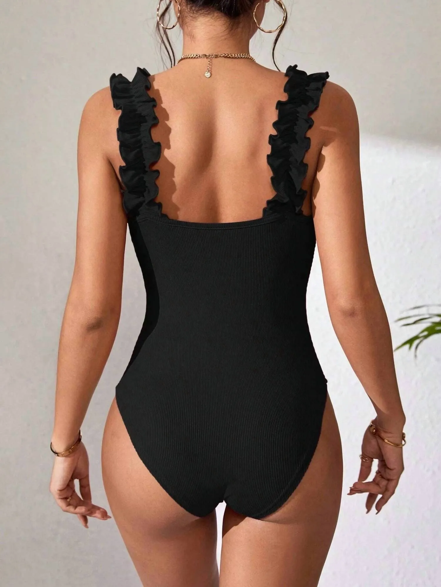 Gestrickter Trägerloser Bodysuit in Schwarz