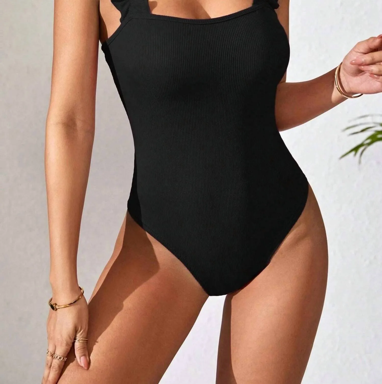 Gestrickter Trägerloser Bodysuit in Schwarz