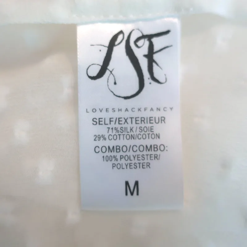 LoveShackFancy Erica Rüschenbluse Creme Spitzenbesatz Schweizer Tupfen Größe M