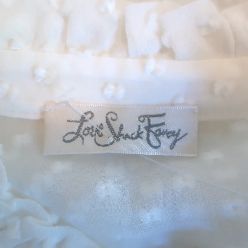 LoveShackFancy Erica Rüschenbluse Creme Spitzenbesatz Schweizer Tupfen Größe M