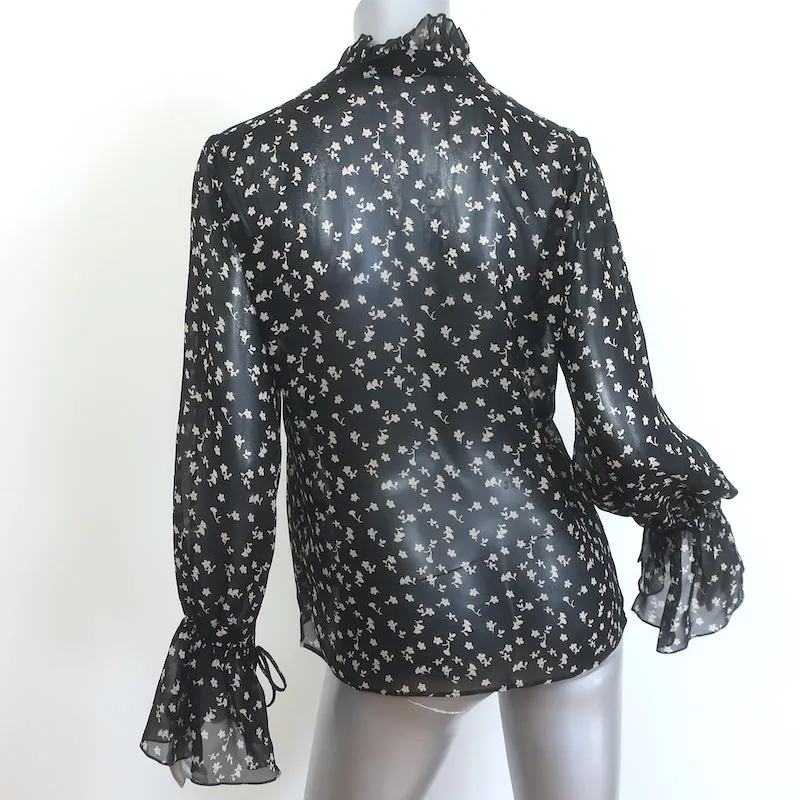 Nili Lotan Bluse mit Glockenärmeln in Schwarz mit Blumenprint aus Chiffonseide in Größe S