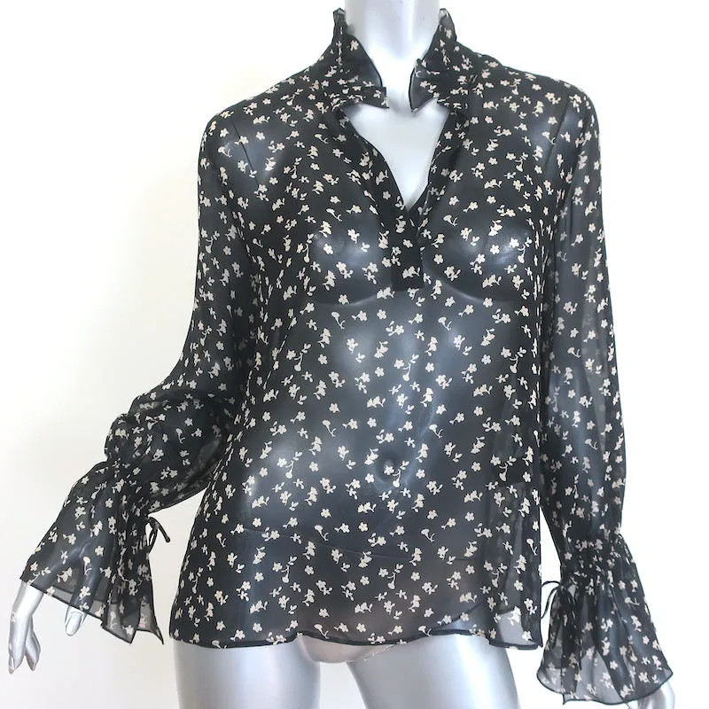 Nili Lotan Bluse mit Glockenärmeln in Schwarz mit Blumenprint aus Chiffonseide in Größe S