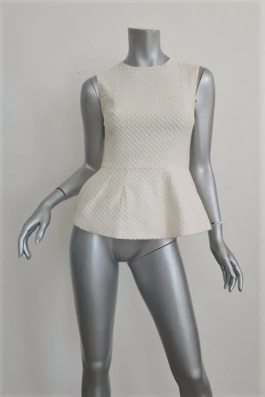 Pierre Balmain Ärmelloses Peplum Top Creme Gepunktet Bestickte Baumwolle Größe 38